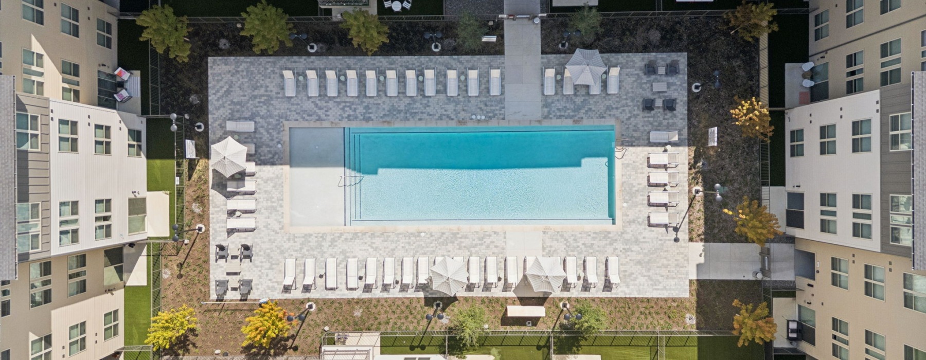 pool with lounge chairs