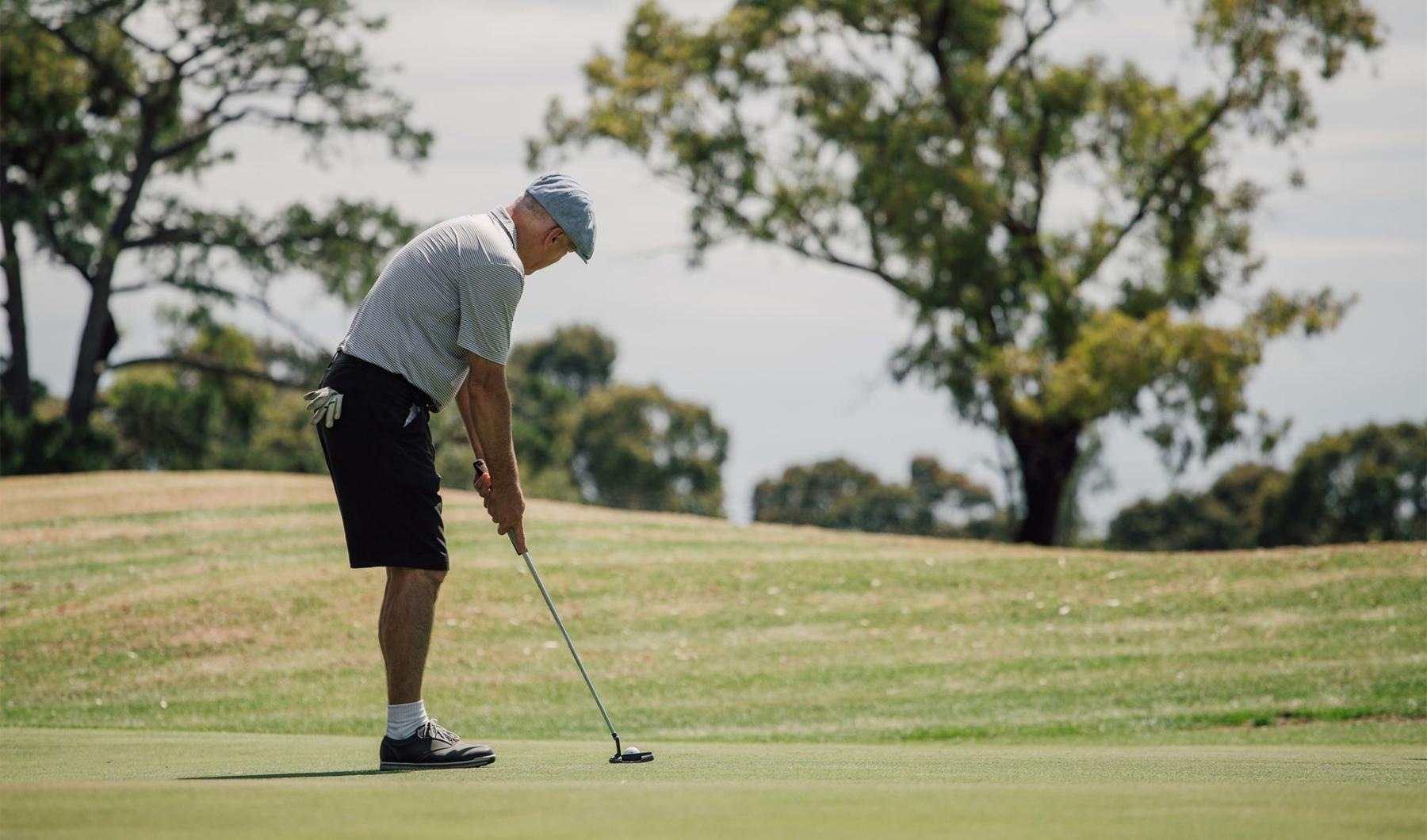 a man playing golf