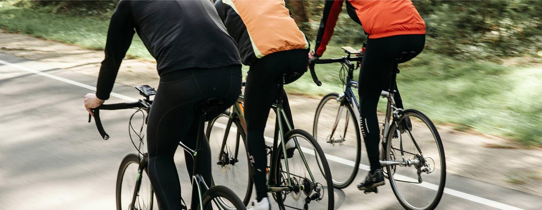 a group of people riding bikes