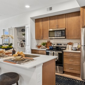 Kitchen with brown cabinets