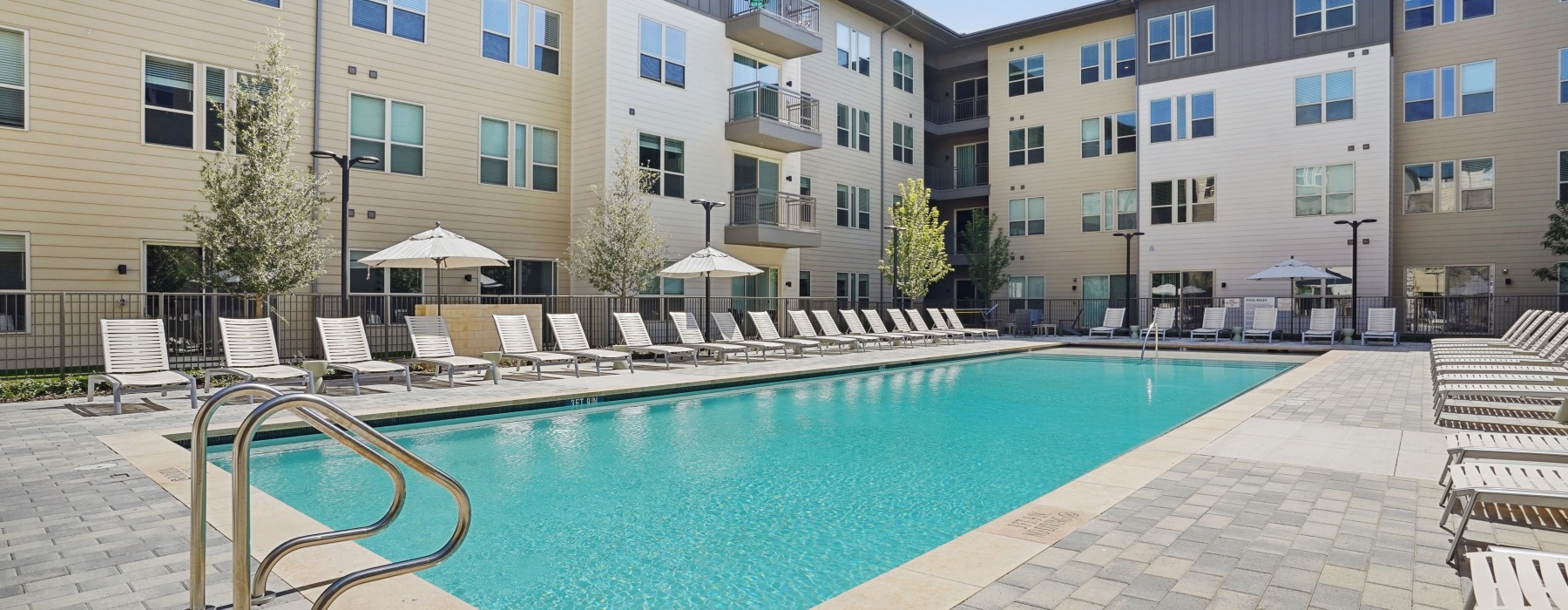 pool with lounge chairs